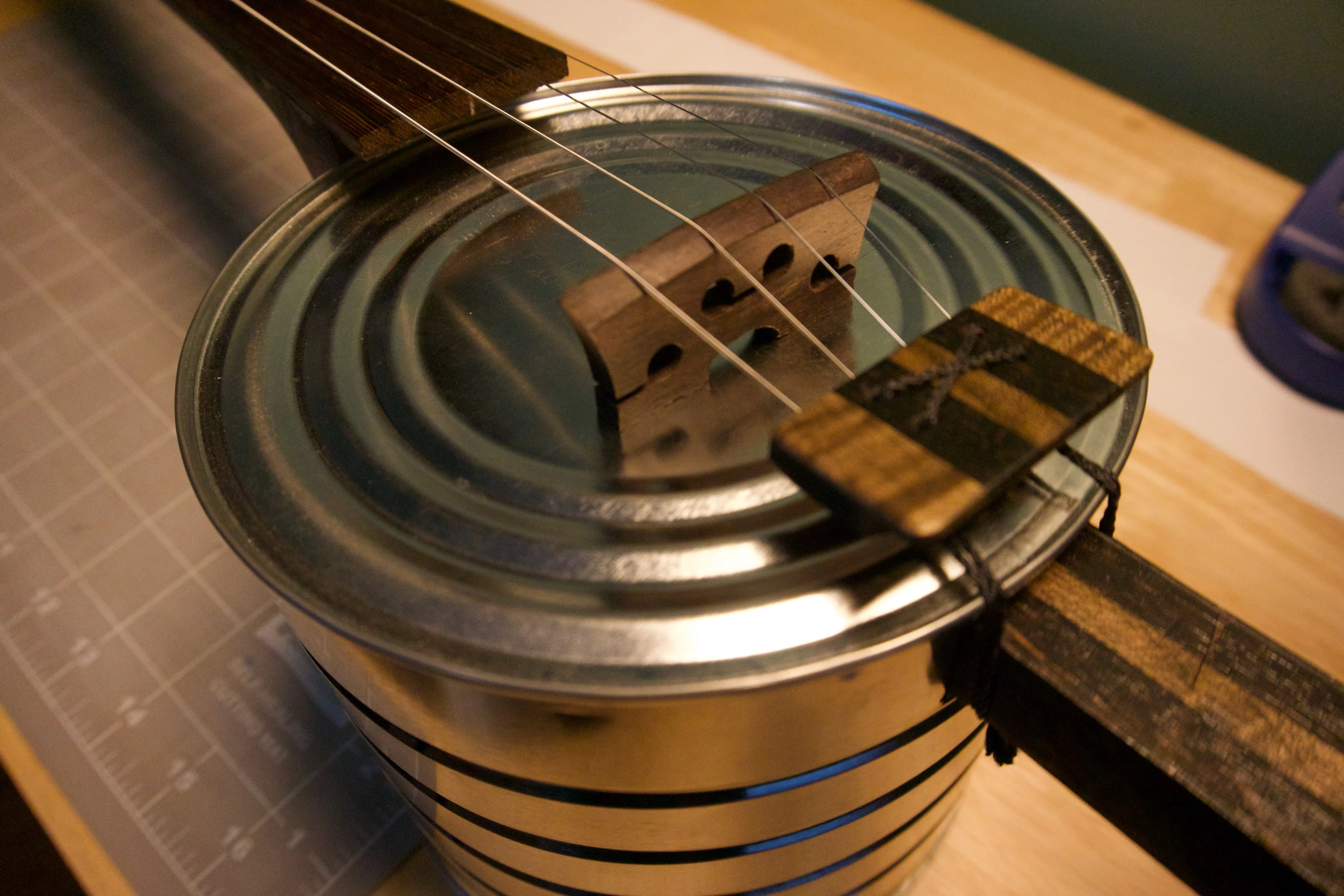 Coffee can banjo, quarter view