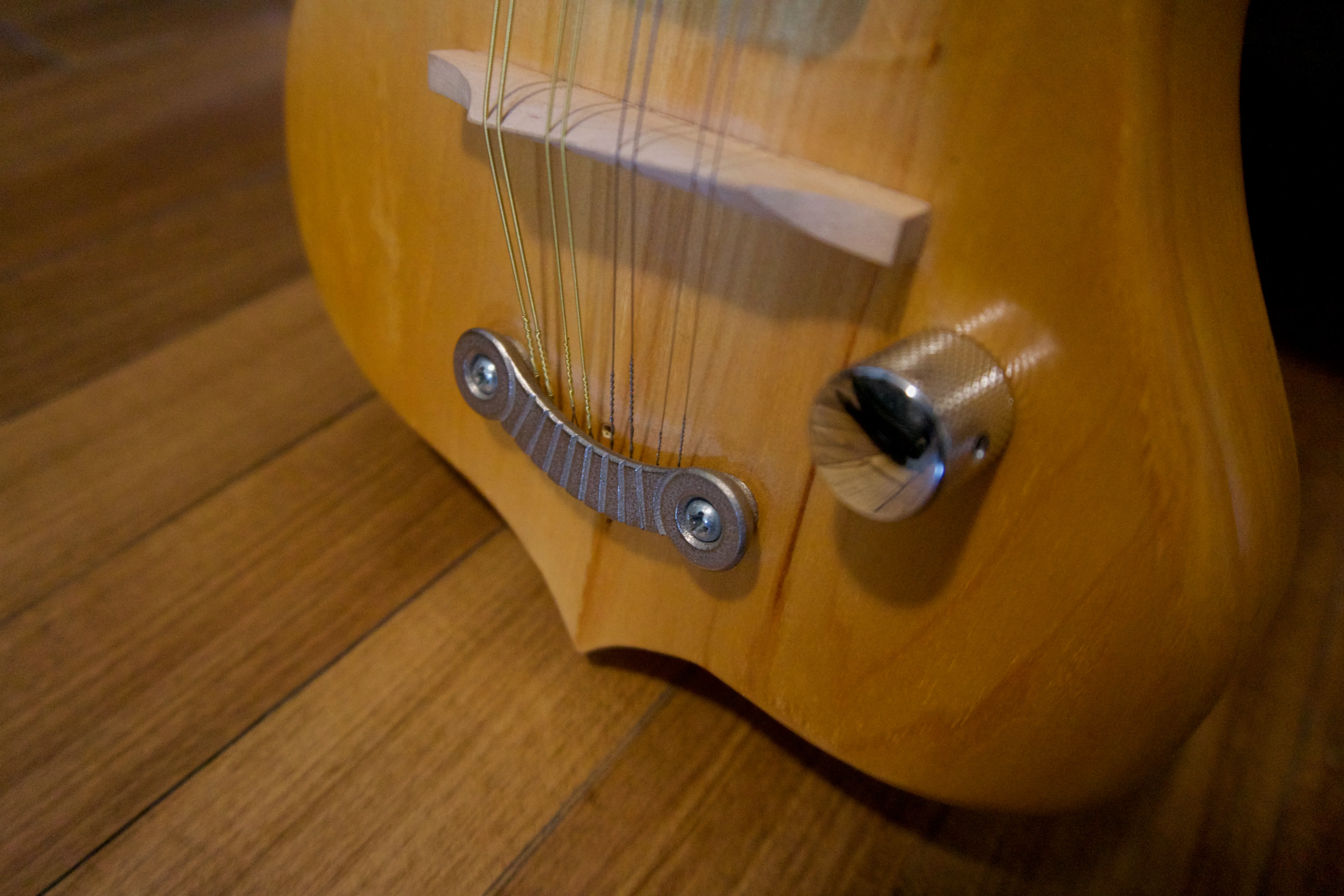 Basswood electric mandolin tailpiece.jpg
